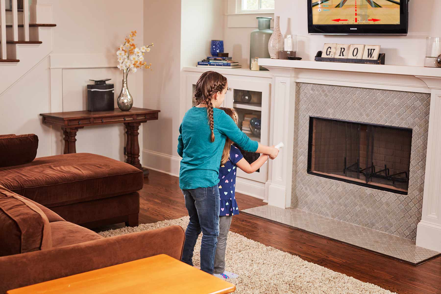 Girls playing Nintendo Wii